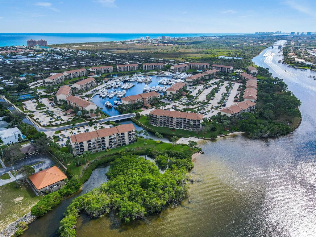 Photo of 2001 Marina Isle Way #102, Jupiter, FL 33477 (MLS # R10946428)