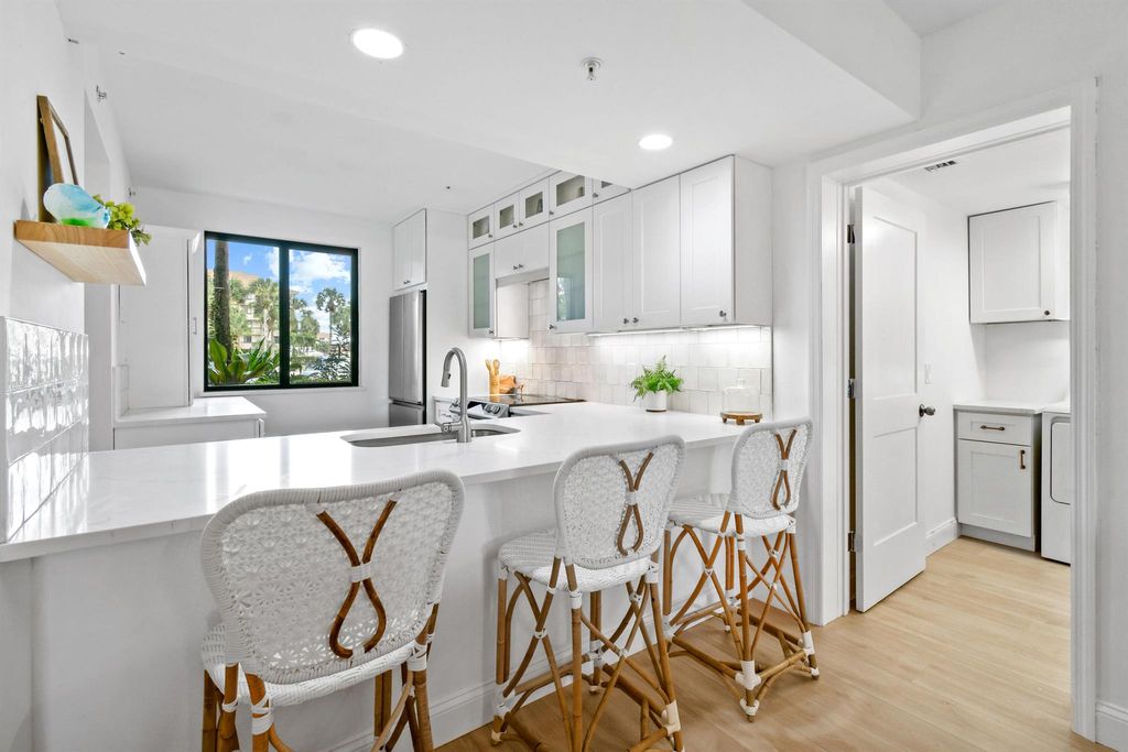 Photo of 2001 Marina Isle Way #102, Jupiter, FL 33477 (MLS # R10946428)