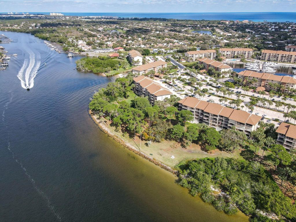 Photo of 2001 Marina Isle Way #102, Jupiter, FL 33477 (MLS # R10946428)