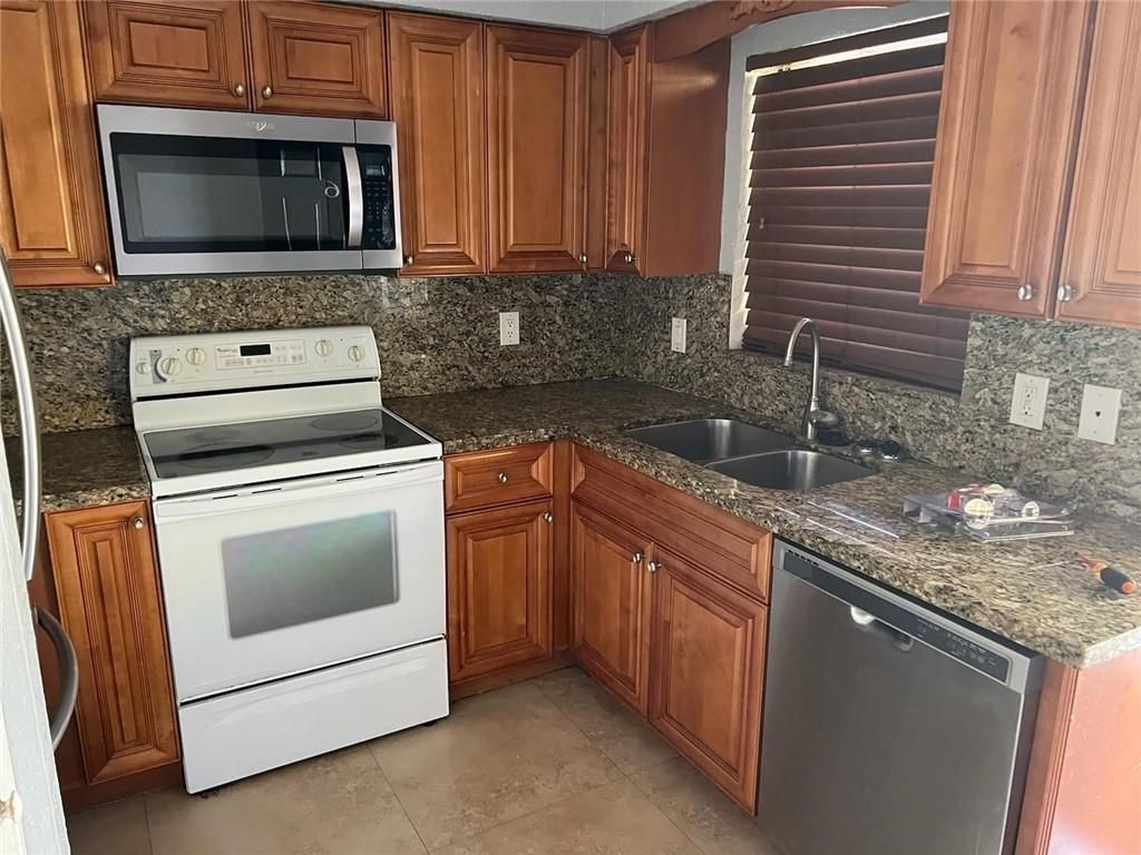 Photo of 8702 NW 38th Drive #6, Coral Springs, FL 33065 (MLS # F10494060)