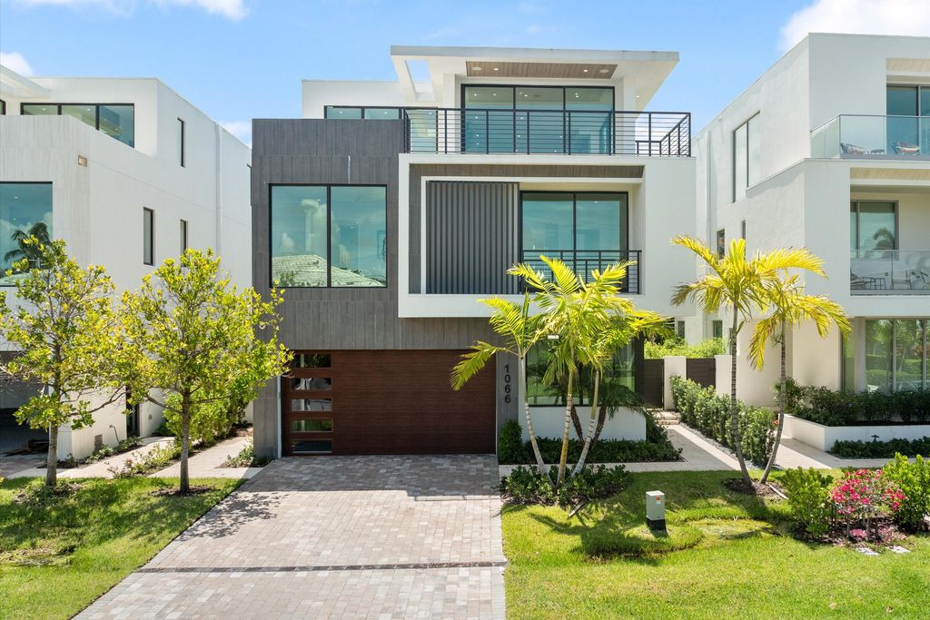 Photo of 1066 Del Harbour Drive, Delray Beach, FL 33483 (MLS # R11018488)