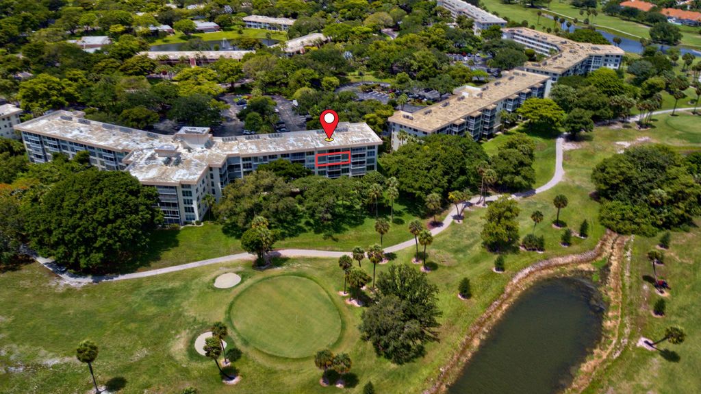 Photo of 3900 Oaks Clubhouse Drive #411, Pompano Beach, FL 33069 (MLS # B26034581)