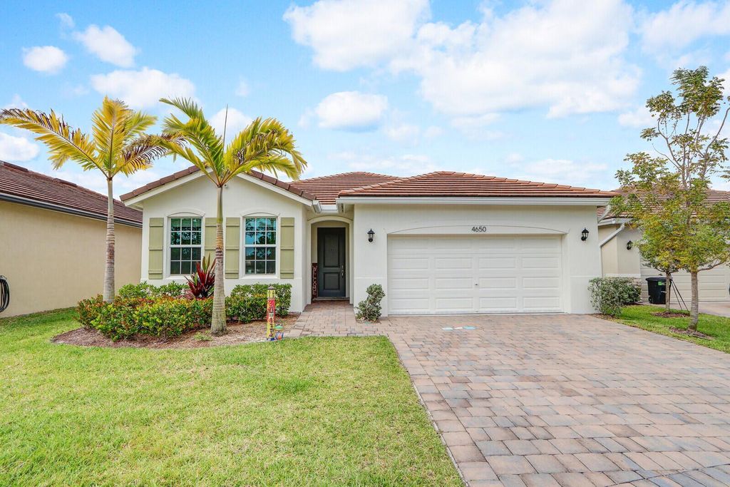 Photo of 4650 NW Exchange Avenue, Jensen Beach, FL 34957 (MLS # R10977270)