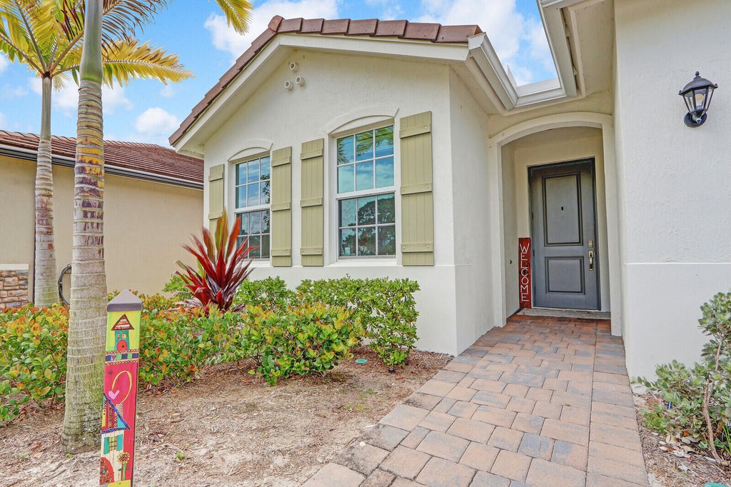 Photo of 4650 NW Exchange Avenue, Jensen Beach, FL 34957 (MLS # R10977270)