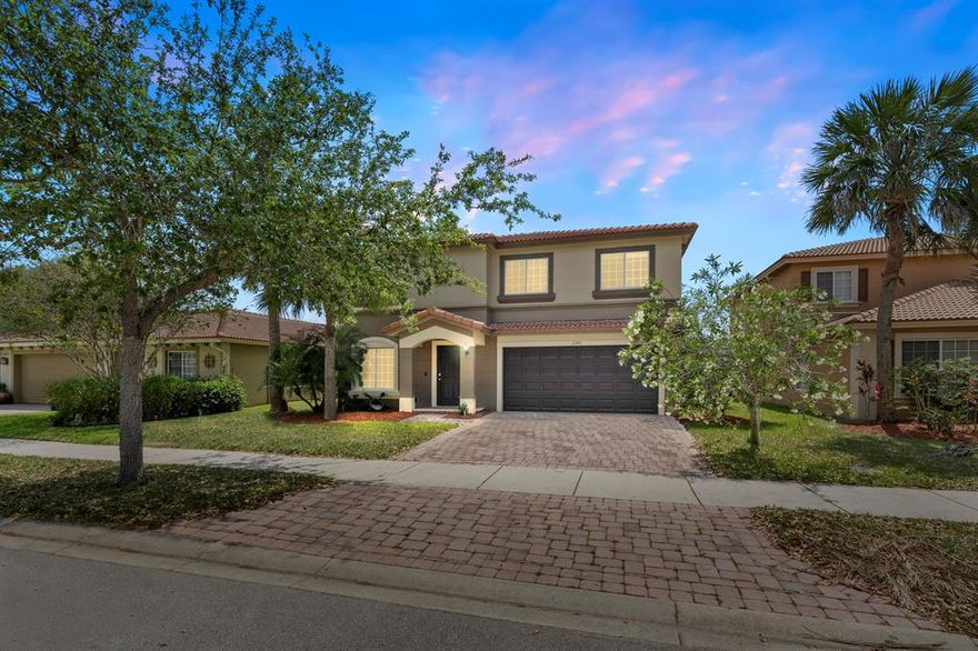 BETTER THAN NEW! It is loaded with upgrades....... Lush landscaping w/ LAKE VIEWS, Granite counter tops, Textured Walls, great floor plan, NEWER energy efficient HOT WATER and AC UNIT, New interior/exterior paint, NEWER Samsung Black Stainless Steel - Dishwasher, Convection Microwave, Double Oven, French door Refrigerator, Washer and Dryer. State of the art Smart Security System includes HD Camera, upgraded sensors on all windows and doors, Keyless entry with keypad, upgraded carbon and smoke detectors, smart light controllable.  LOCATION, LOCATION.. Great for commuting, close to I-95. Close to everything...Shopping, Dining, Entertainment. PRIDE OF OWNERSHIP. As soon as you see it, you will want to call it '' HOME''! Has all the 'I Wants