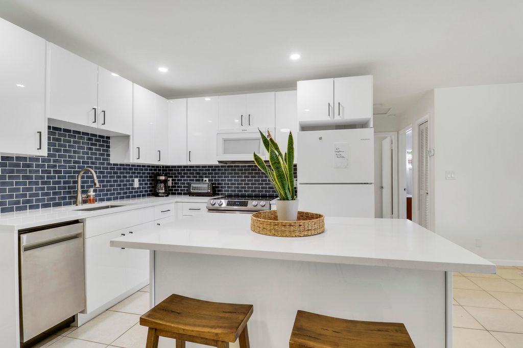 Photo of 9285 Sun Court, West Palm Beach, FL 33403 (MLS # R11128497)