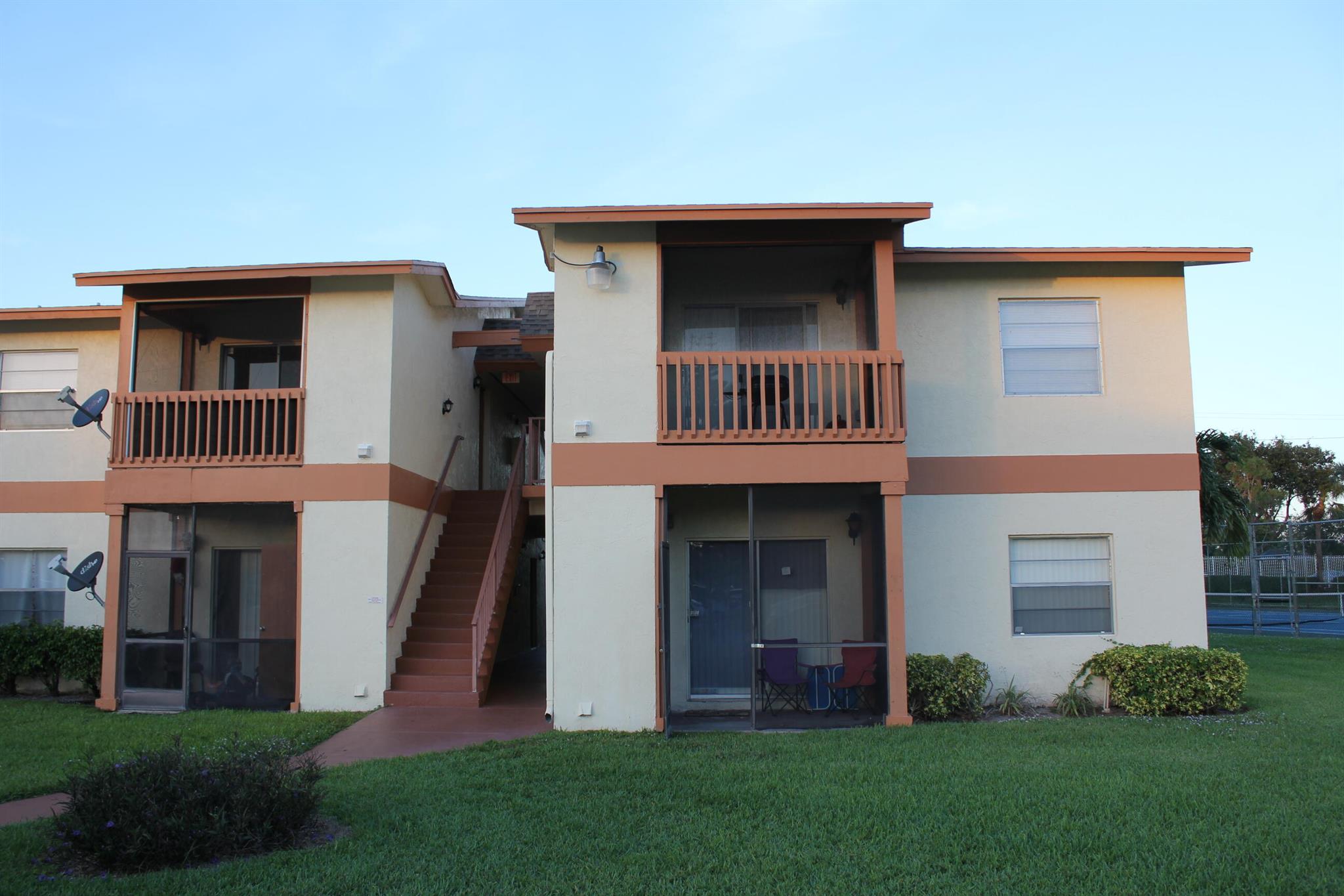 This charming second-floor apartment features sleek laminate flooring throughout, a modern kitchen with stainless steel appliances, and a bright, open layout designed for comfortable living. Ideally located in West Palm Beach, just minutes from Wellington, shopping, dining, and major highways.Enjoy resort-style amenities including a sparkling community pool and tennis court, perfect for relaxation or recreation. A wonderful opportunity to live in a vibrant, centrally located community with everything at your fingertips!