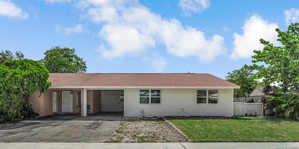 Photo of 4806 Gladiator Circle, Greenacres, FL 33463 (MLS # R11103749)