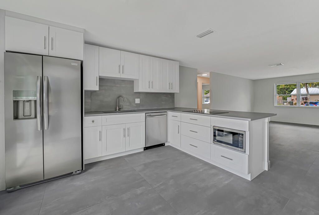 Photo of 4806 Gladiator Circle, Greenacres, FL 33463 (MLS # R11103749)