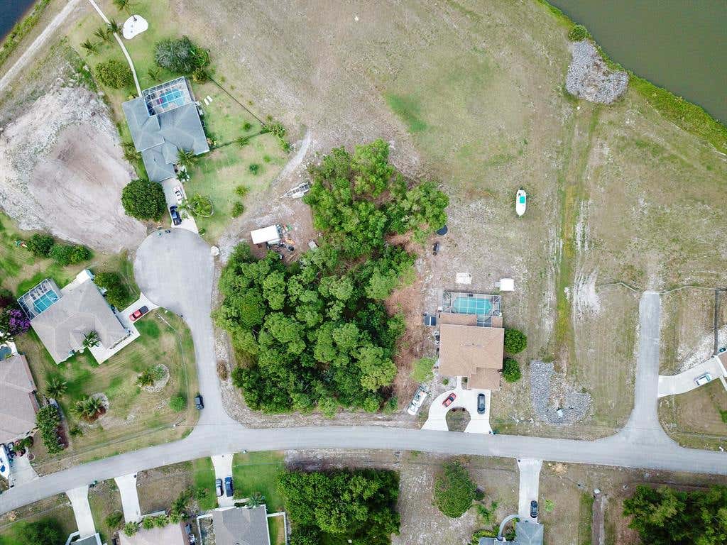 Photo of 2749 SW Ann Arbor Road, Port Saint Lucie, FL 34953 (MLS # R10715272)