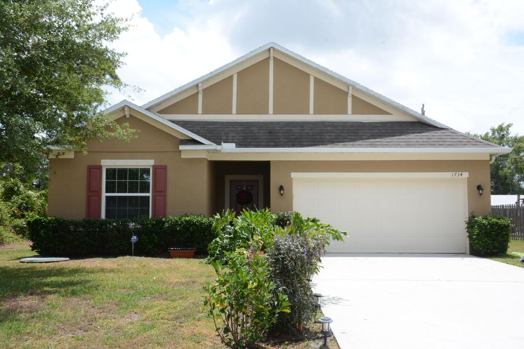 Photo of 1734 SW Commerce Avenue, Port Saint Lucie, FL 34953 (MLS # R10796347)