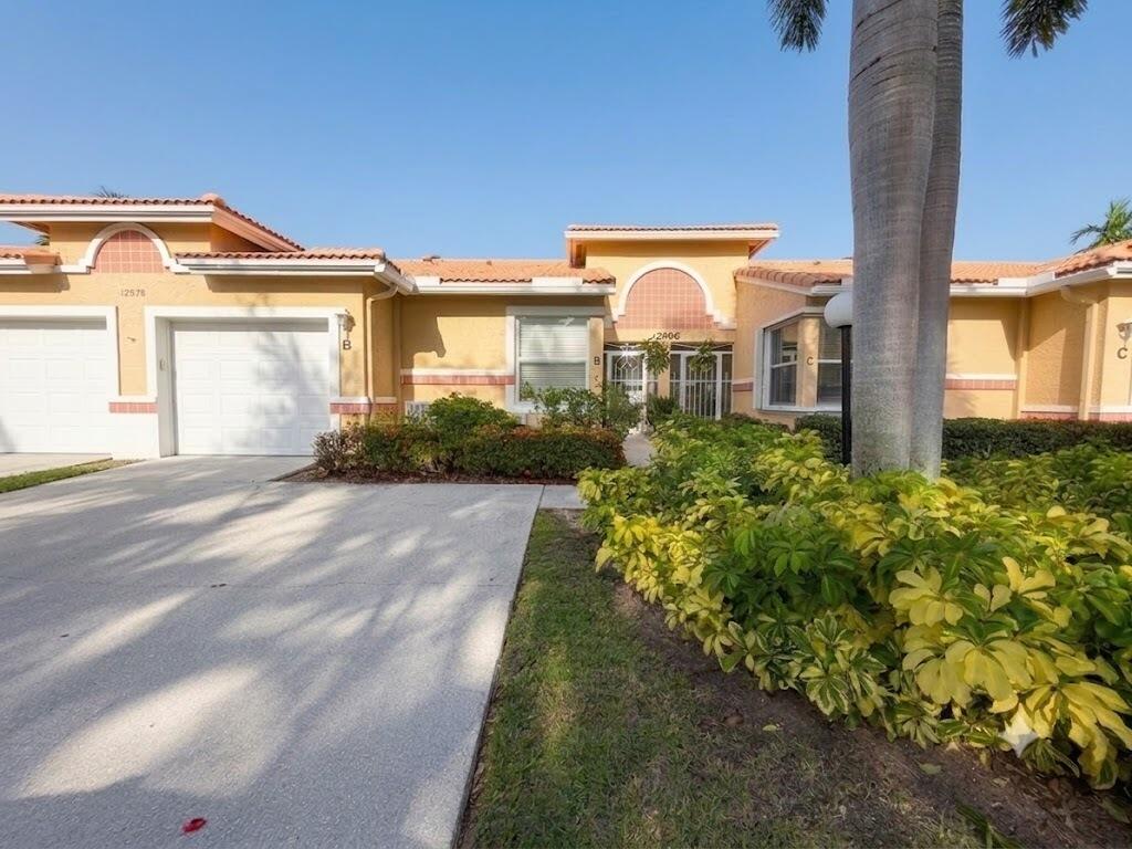 Photo of 12598 Crystal Pointe Drive #B, Boynton Beach, FL 33437 (MLS # B26056886)