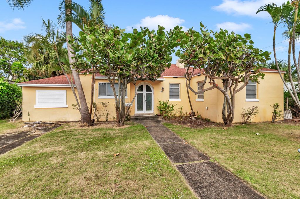 Photo of 309 Nathan Hale Road, West Palm Beach, FL 33405 (MLS # R11140196)