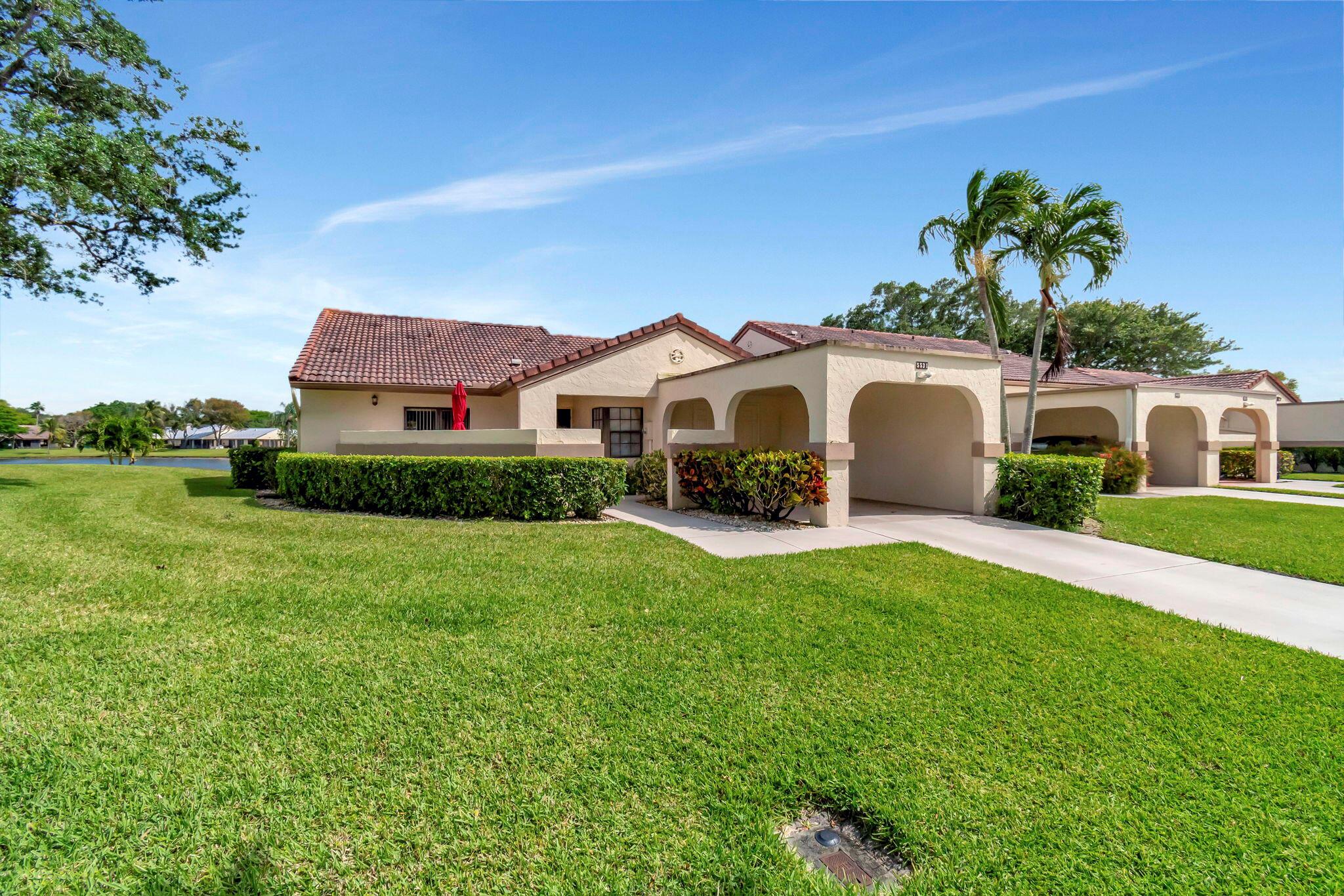 Don't miss this impeccably maintained Villa in Aberdeen East. This 2 bedroom/ 2 bath unit is completely Turnkey. The home also features an updated , completely outfitted kitchen. Tiled throughout-No carpeting. You can enjoy the beautiful lake views on your air-conditioned L-Shaped lanai that is glass and screened enclosed.Aberdeen East is an active 55+ community with clubhouse, card rooms, ballroom for shows and events, resort pool/spa, gym, tennis, pickle ball and 3 satellite pools and too many activities to mention.