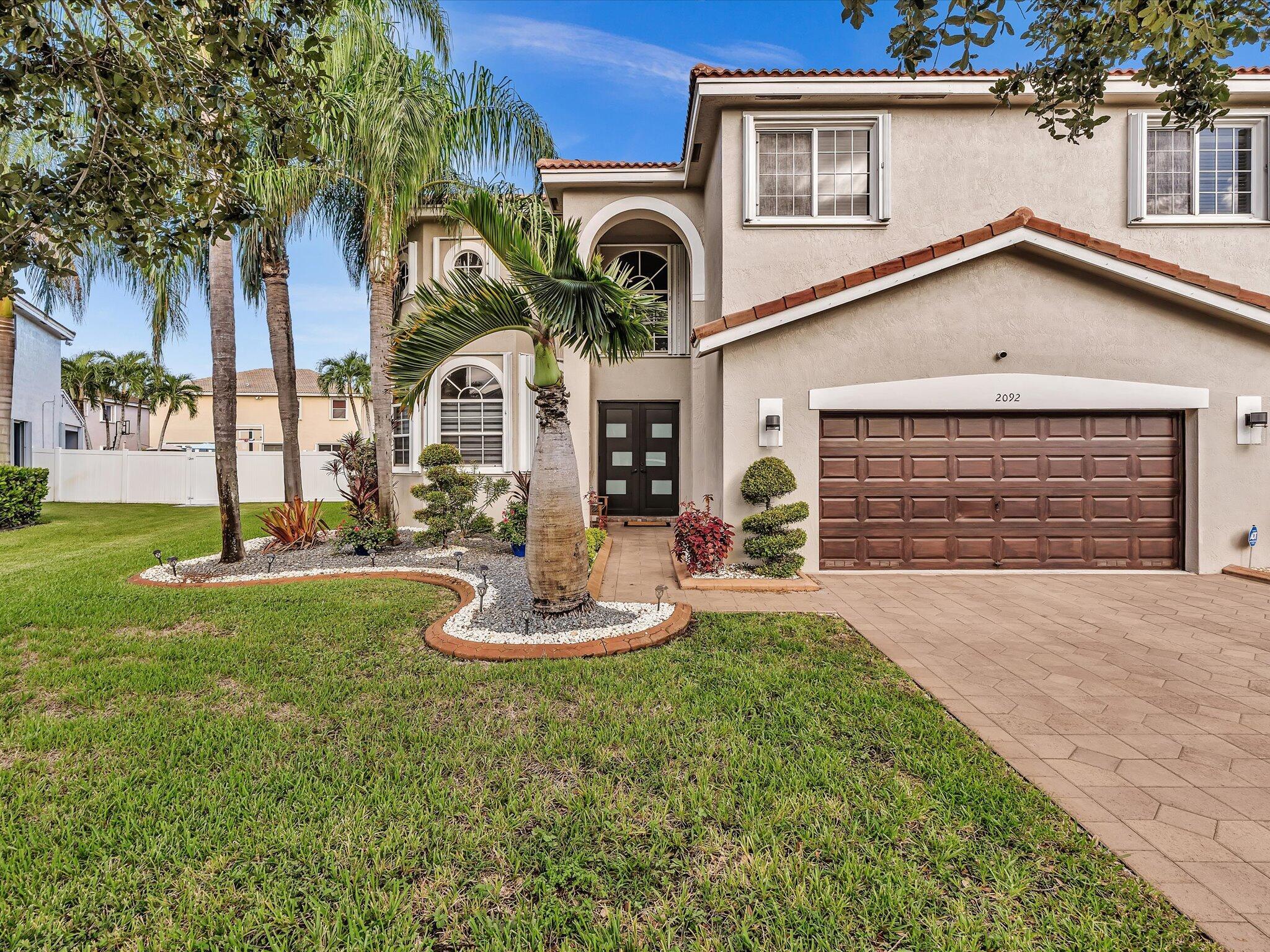 PRICE REDUCED! SELLER IS HIGHLY MOTIVATED! INCREDIBLE OPPORTUNITY! BRING ALL OFFERS! SCHEDULE YOUR SHOWING TODAY!Beautifully updated home in the sought-after Silver Lakes community of Miramar. This spacious 4-bedroom, 2.5-bath residence showcases an open floor plan with a sparkling pool and 2-car garage. Interior highlights include white ceramic tile and wood flooring throughout, an Italian-style kitchen with top-of-the-line appliances, and stunning new glass staircase railings. Every room and bathroom has been thoughtfully renovated, featuring crown moldings, high-hat lighting, textured ceilings, and upgraded finishes for a modern touch.Perfectly situated near I-75