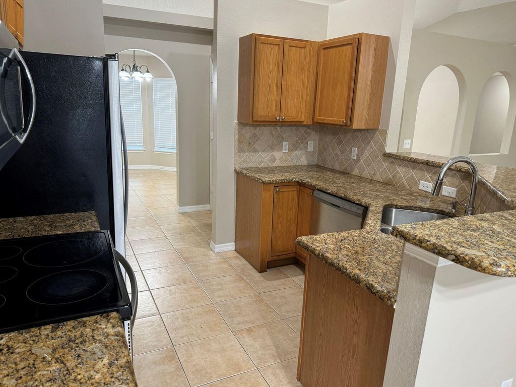 Photo of 5251 NW Gamma Street, Port Saint Lucie, FL 34986 (MLS # R11046095)