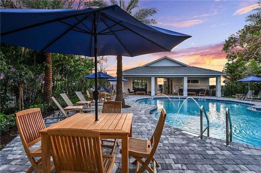 Photo of 552 Sanderling Circle, Deerfield Beach, FL 33442 (MLS # B26003199)