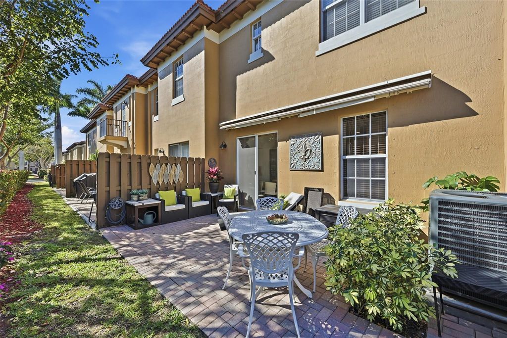 Photo of 6982 Julia Gardens Drive, Coconut Creek, FL 33073 (MLS # F10550349)