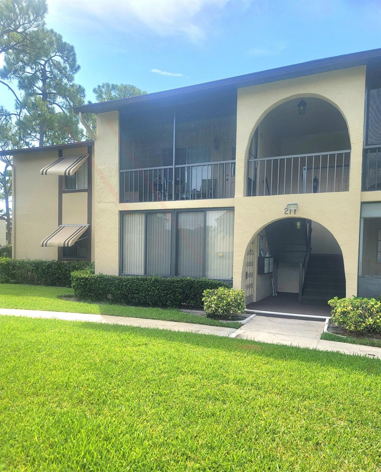 Your opportunity to own this 1st floor, bright and sunny condo with extensive garden views. This 2 bedroom and 1 bath condo has been freshly painted and ready to move in. A large screened in covered patio with ample storage. In unit Washer and Dryer room. Tile through out expect for the bedrooms.This active 55+ lifestyle community with may amenities such as pool, clubhouse, and shuffleboard just steps away. Easy access to the many shopping areas, dining, and entertainment. Call today for your VIP tour!