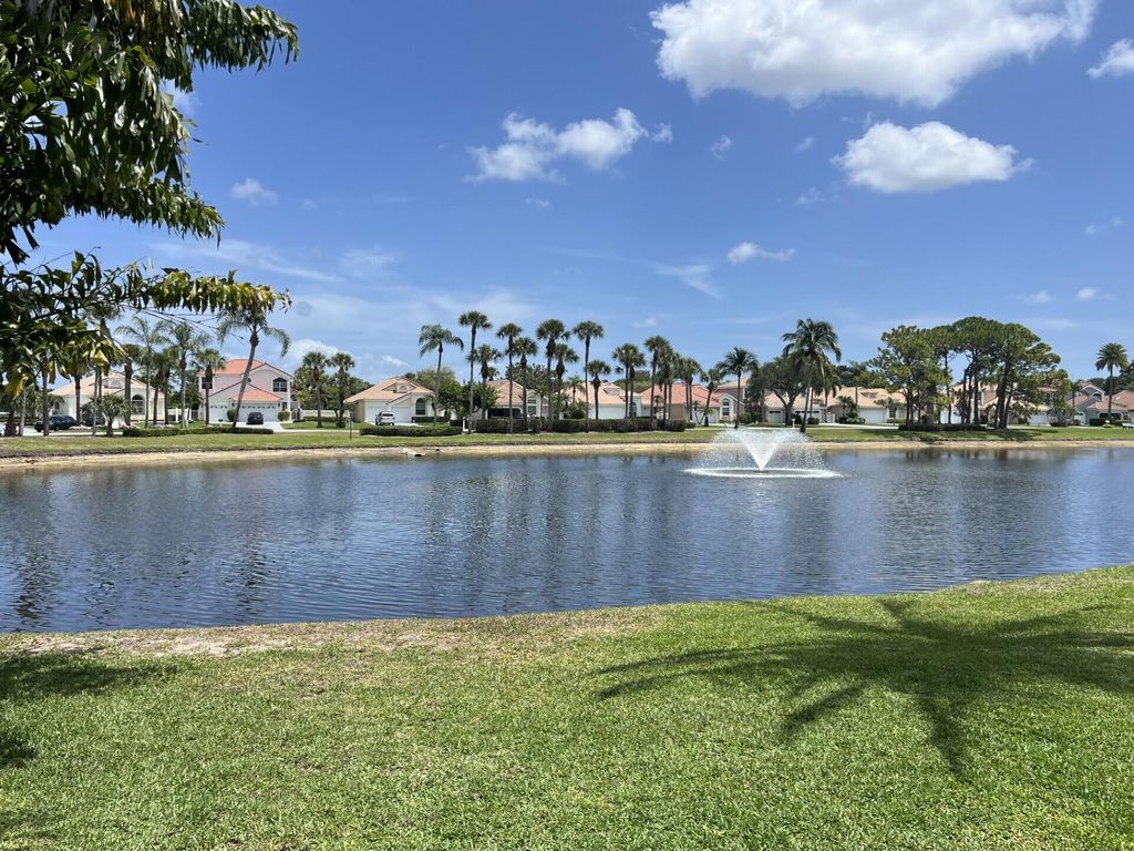 Photo of 12921 Oak Knoll Drive, Palm Beach Gardens, FL 33418 (MLS # R11137671)