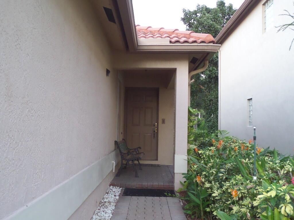 Photo of 4008 Rocks Point Place, Riviera Beach, FL 33407 (MLS # R10980133)