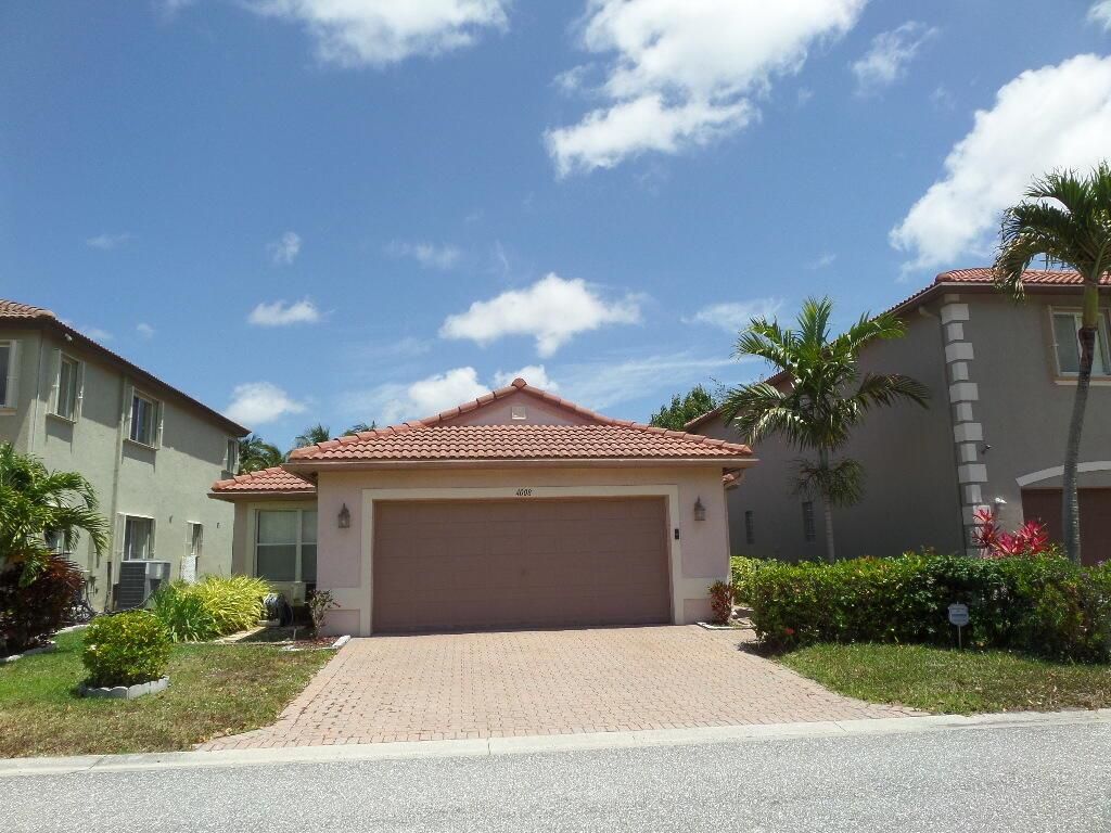Photo of 4008 Rocks Point Place, Riviera Beach, FL 33407 (MLS # R10980133)