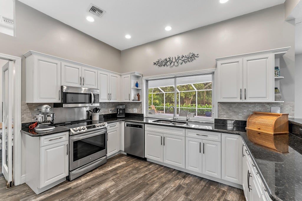 Photo of 9807 SW Pueblo Terrace, Palm City, FL 34990 (MLS # R11048303)