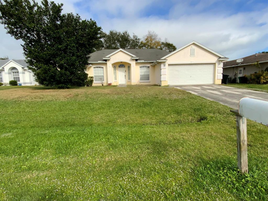 Photo of 1157 SE Mendavia Avenue, Port Saint Lucie, FL 34952 (MLS # R11148664)
