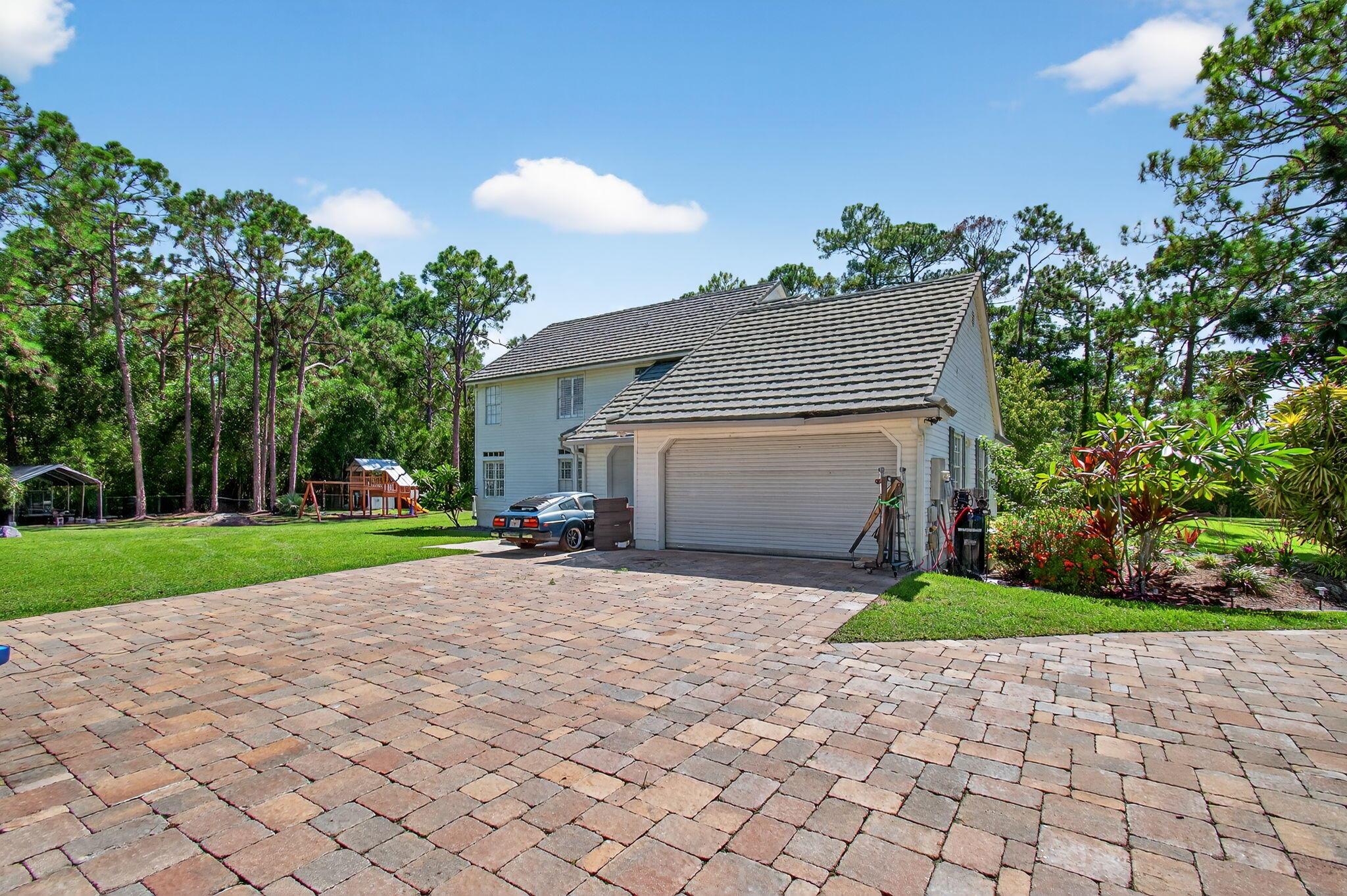 13884 71st Place N, West Palm Beach, FL, 33412/$660,000 3 13884 71st Place N