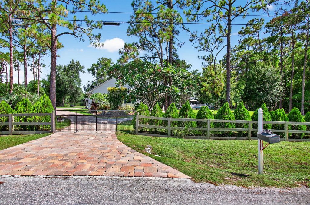 Photo of 13884 71st Place N, West Palm Beach, FL 33412 (MLS # R11110246)