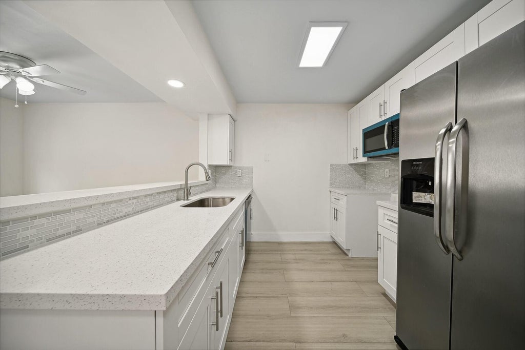 Photo of 7410 NW 75th Street #7410, Tamarac, FL 33321 (MLS # F10447583)