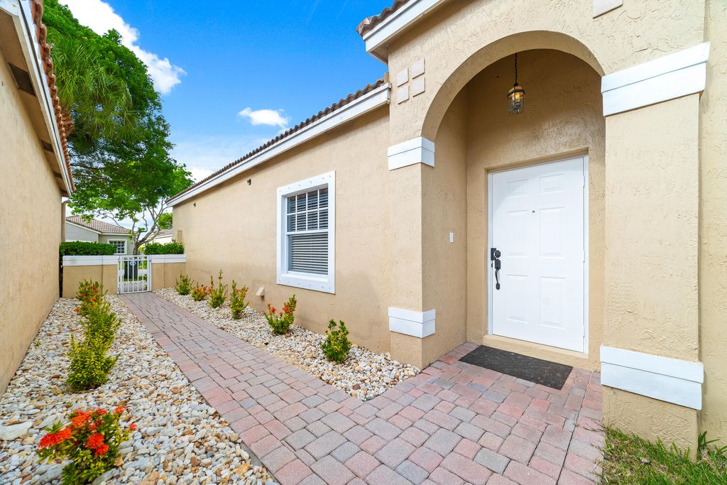 Photo of 3962 NW 62nd Court, Coconut Creek, FL 33073 (MLS # R10994307)