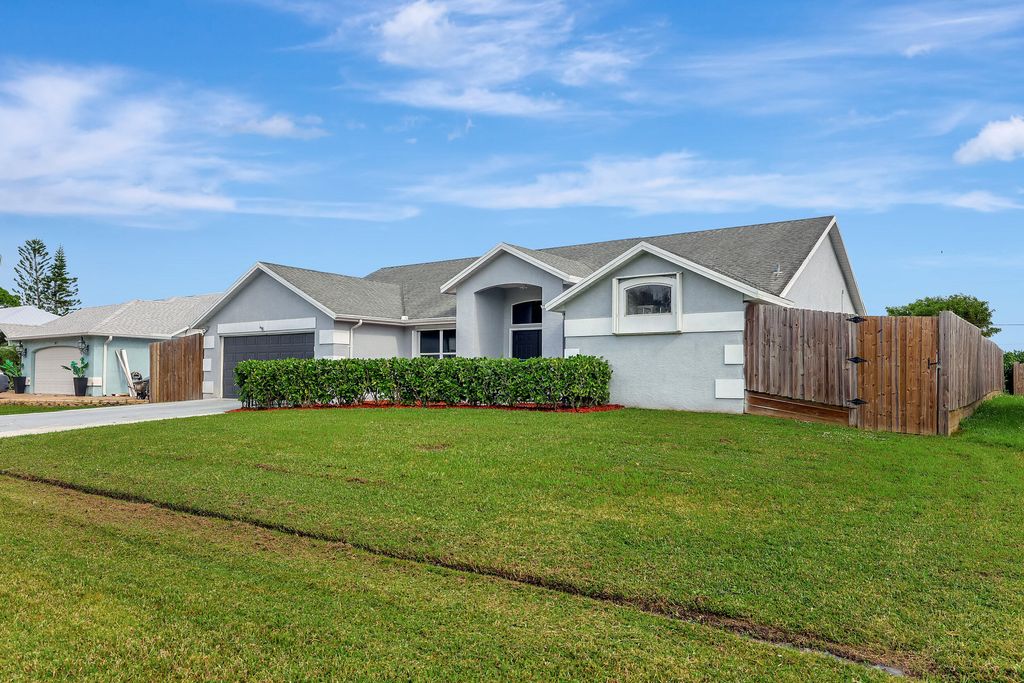 Photo of 2065 SE Mary Terrace, Port Saint Lucie, FL 34952 (MLS # R10941071)