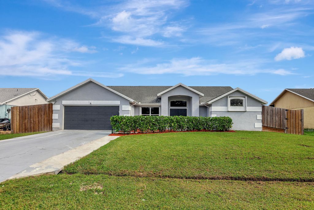 Photo of 2065 SE Mary Terrace, Port Saint Lucie, FL 34952 (MLS # R10941071)