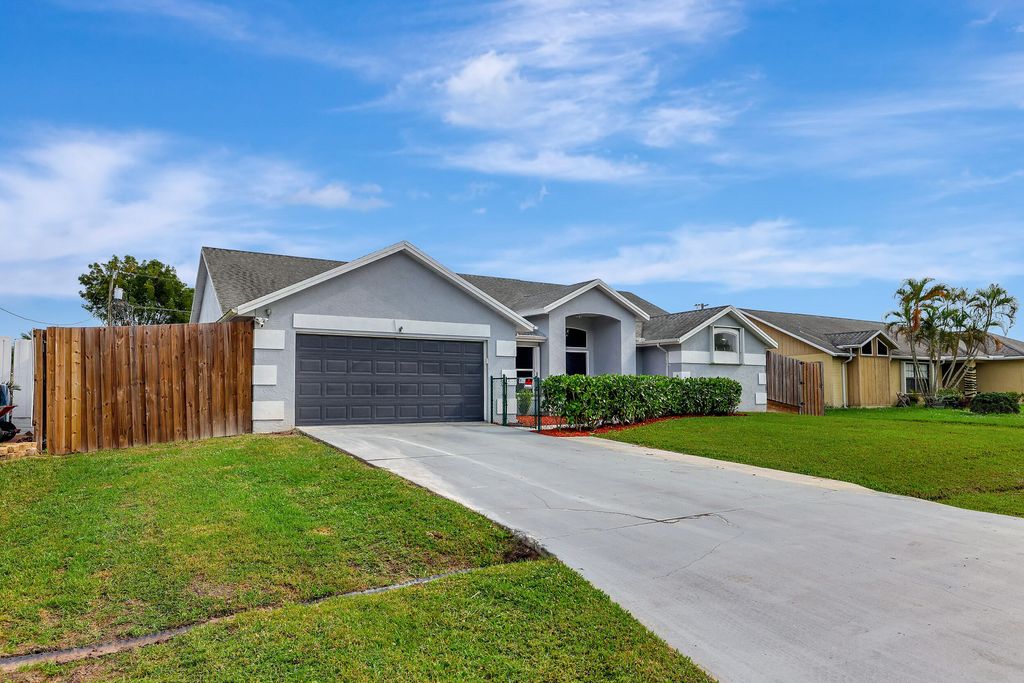 Photo of 2065 SE Mary Terrace, Port Saint Lucie, FL 34952 (MLS # R10941071)