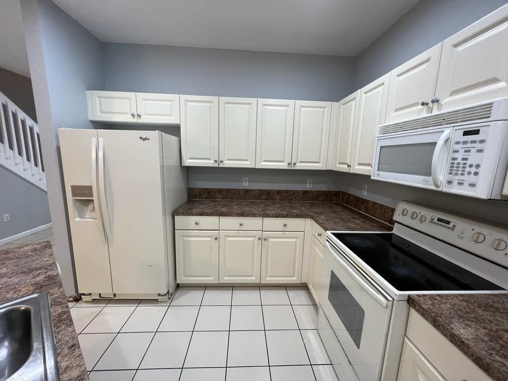 Photo of 2018 Freeport Lane, Riviera Beach, FL 33404 (MLS # F10524186)