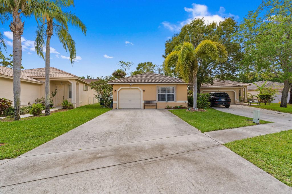 Photo of 121 Prestige Drive, Royal Palm Beach, FL 33411 (MLS # B26012494)