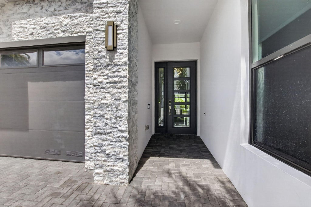 Photo of 17237 Windy Pointe Lane, Boca Raton, FL 33496 (MLS # B26056232)