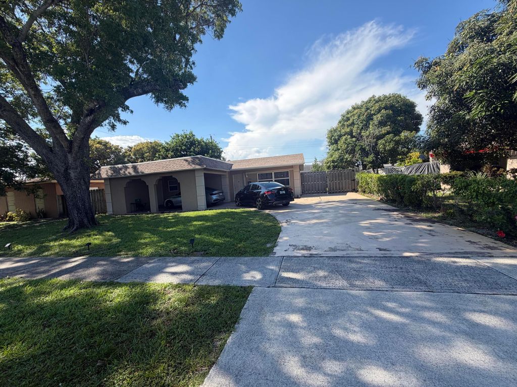 Photo of 4351 NW 32nd Court, Lauderdale Lakes, FL 33319 (MLS # B26029472)