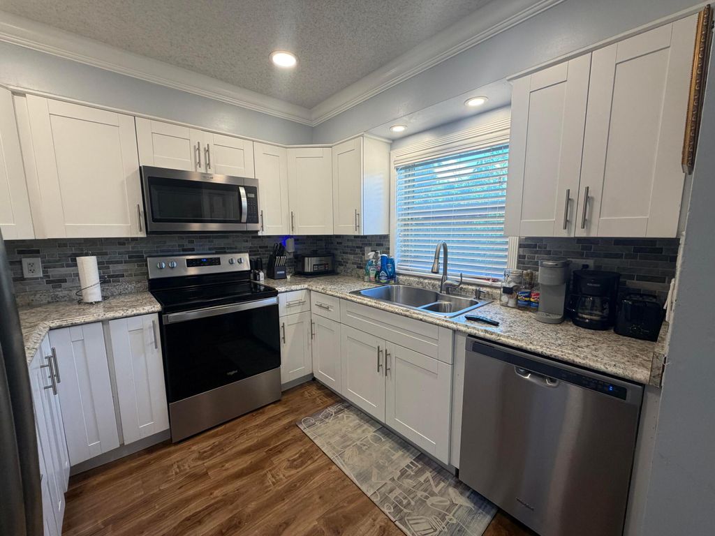 Photo of 4351 NW 32nd Court, Lauderdale Lakes, FL 33319 (MLS # B26029472)