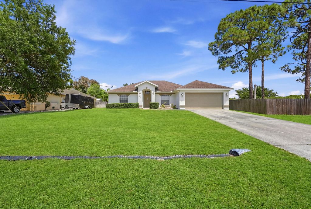 Photo of 1293 SW Kalevala Drive, Port Saint Lucie, FL 34953 (MLS # B26040610)
