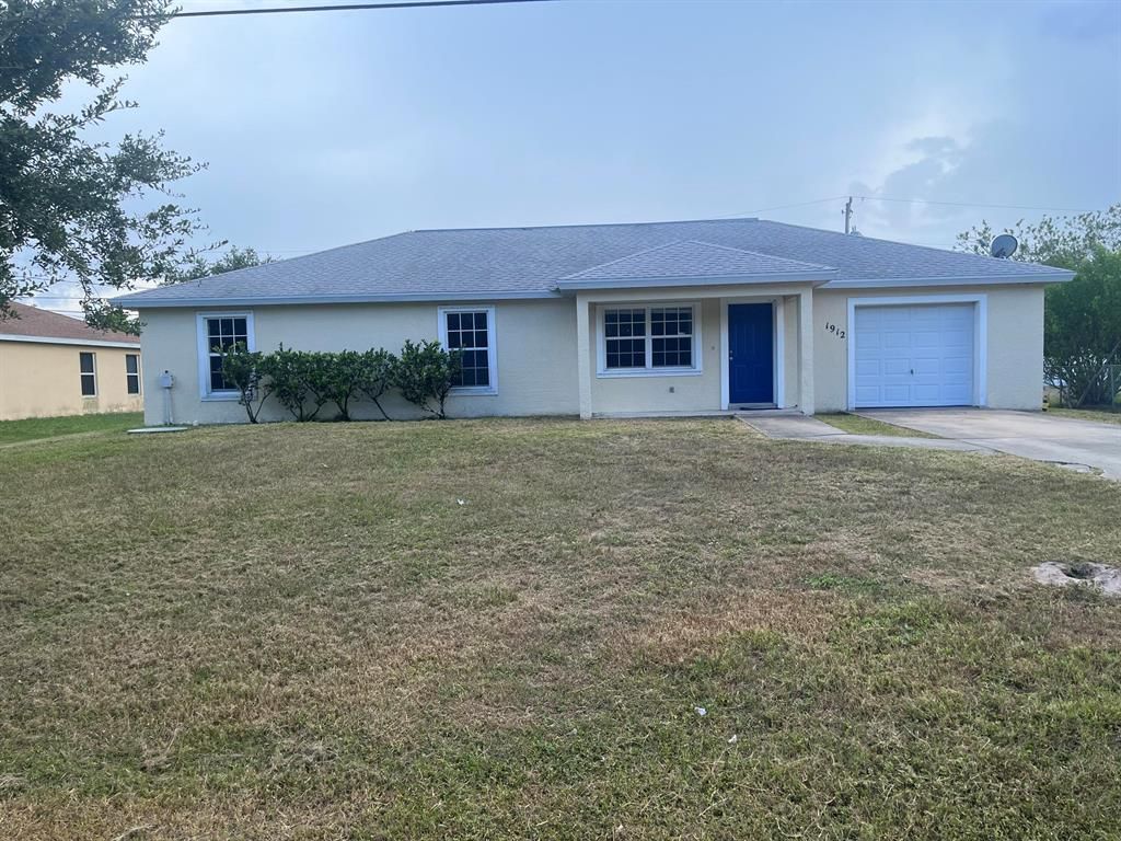 Photo of 1912 SE Berkshire Boulevard Blvd, Port Saint Lucie, FL 34952 (MLS # R10828586)