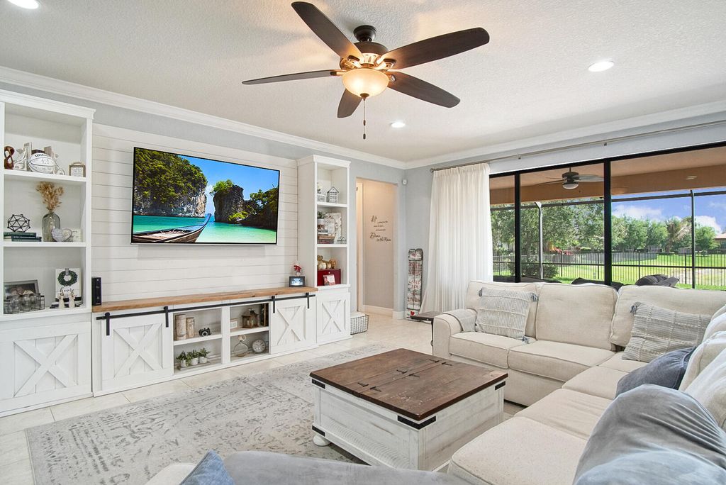 Photo of 301 SE Huntington Circle, Port Saint Lucie, FL 34984 (MLS # B26012496)