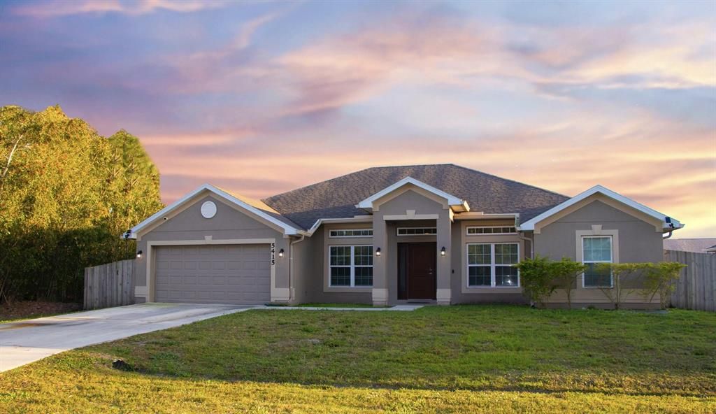 Photo of 5415 NW Consumer Avenue, Port Saint Lucie, FL 34983 (MLS # R10792684)