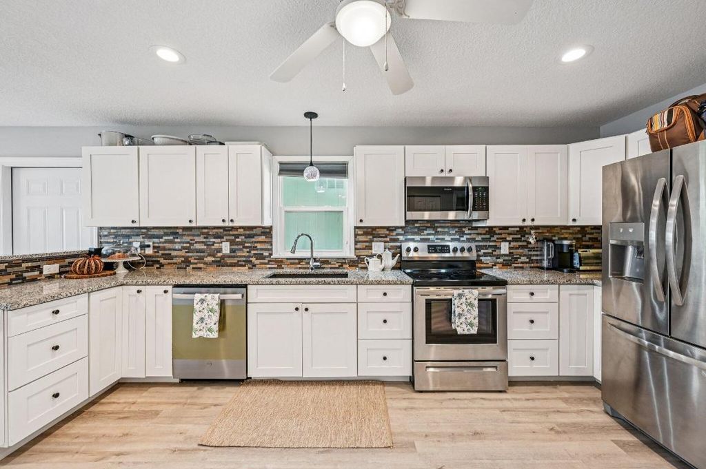 Photo of 251 SE Paradise Place, Stuart, FL 34997 (MLS # R11136704)