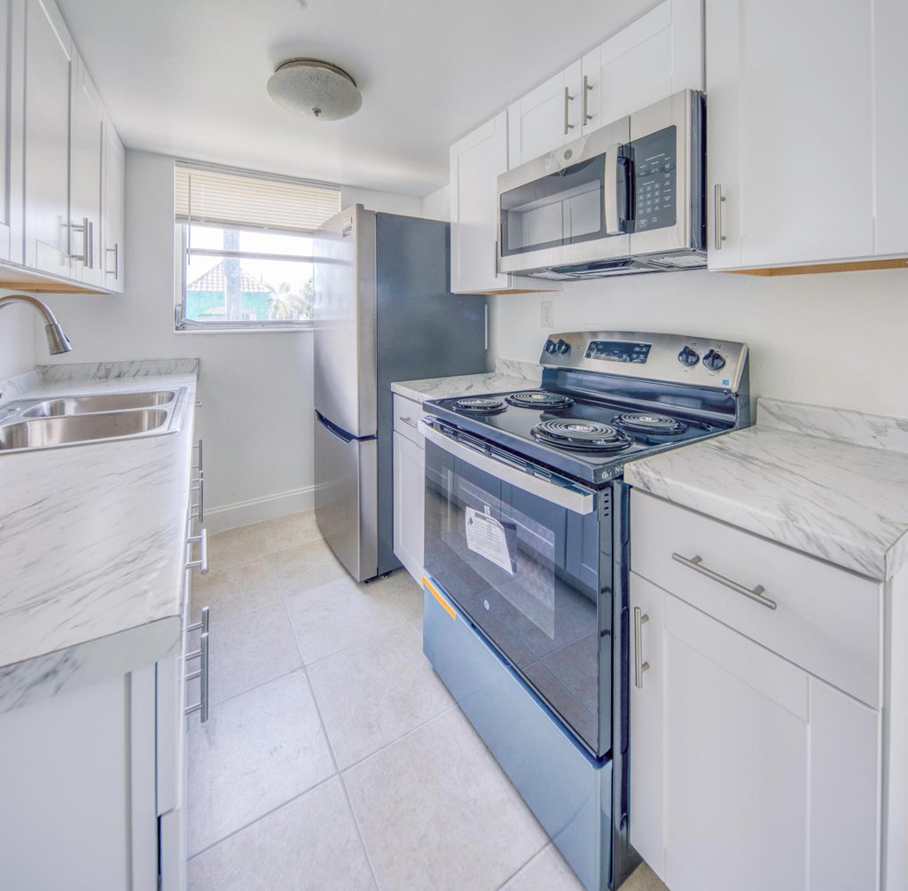 Photo of 201 S J Street #12, Lake Worth Beach, FL 33460 (MLS # B26081489)
