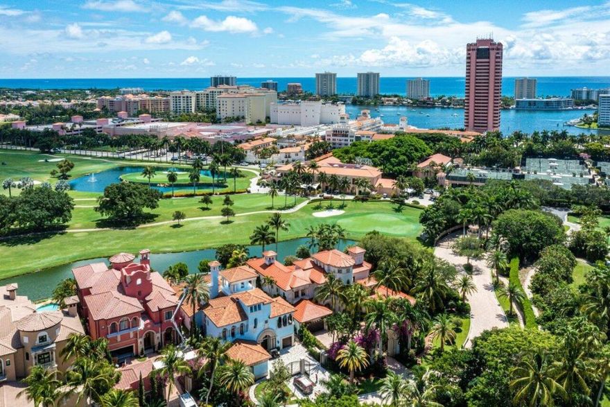 Absolutely Extraordinary Estate on the grounds of the famed Boca Raton Resort and located on the most fabulous lot (over .59 Acres) in all of Mizner Lake Estates with incredible views of the golf course, lake and grounds of the resort. Features include a New Roof, impressive, gated entrance, beautiful living room with a decorative fireplace and high detailed ceilings, formal dining room with a wine room, huge chef's kitchen with custom cabinetry, new appliances and separate bar area. The first floor Master has a large sitting and 2 Master baths, there's a rich wood library with a full bath and 2 large bedrooms on the 2nd floor. The 3rd floor consists of an entertaining area, bar and balcony The loggia w/summer kitchen, pool/spa and a separate guest house.