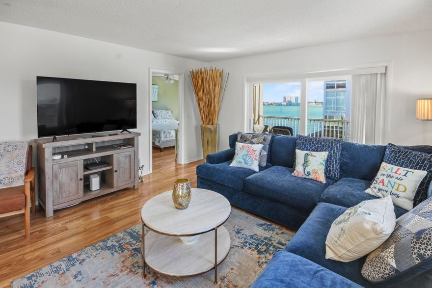 Experience the pinnacle of coastal living in this immaculate, turnkey condo located directly across from Singer Island.  This lovingly maintained home comes fully furnished, offering a seamless transition to your new tropical retreat. Wake up to breathtaking sunrises on your private lanai before heading out for a world-class snorkeling session at the nearby Blue Heron Bridge.  Whether you're catching the ferry to Peanut Island, chartering a boat for a day on the water, or playing golf at one of our famous courses, or exploring the upscale dining and shopping at The Gardens Mall and PGA Blvd, everything you need is moments away.  Just bring your toothbrush and start living the Florida dream