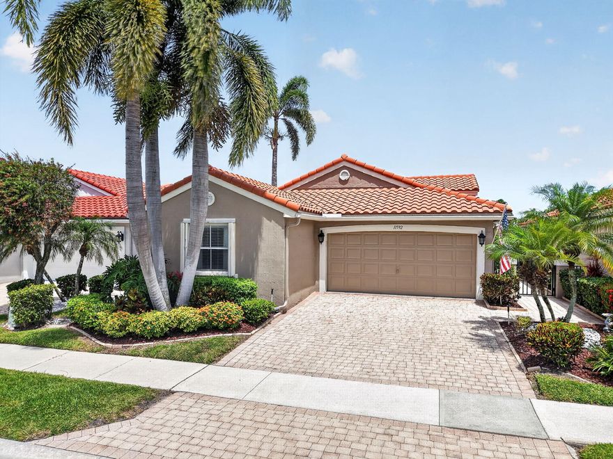 Former builder's model with an east-facing water view in The Cascades—one of Boynton Beach's premier gated 55+ communities with resort-style amenities and an active clubhouse lifestyle. This move-in ready Amhurst model features a newer A/C (2023) and 2009 roof. Bright, open layout with vaulted ceilings and laminate flooring throughout.The eat-in kitchen offers granite countertops and updated black stainless appliances, opening to spacious living areas ideal for entertaining. The primary suite includes a walk-in closet plus custom wall storage, while the 3rd bedroom is currently used as a den/guest room—perfect for flexible living. Enjoy the large-screened patio overlooking the water, ideal for morning coffee or evening relaxation with peaceful views. Additional features include accordion hurricane shutters. Offered furnished for a truly move-in ready experience.    Located in The Cascades of Boynton Beach, a premier gated 55+ community with resort-style amenities, clubhouse, fitness center, tennis, pickleball, social clubs, and active lifestyle programming.   The Cascades boasts a resort-style atmosphere from the moment you drive through the gate and see the Westchester Golf Course.   The Cascades is a NON-Equity (no membership) community.  The Cascades offers a large re-modeled clubhouse that has: Broadway-type entertainment all year long in an updated Ballroom  The resort-style pool where some social events are hosted separate hot tub area 2nd pool in Wedgewood section Exercise classes are held daily in each pool Lots of clubs  Many actives multiple card rooms billiard room large art room plus kiln on site   The Cascades has a state-of-the-art fitness facility that has classes along with exercise equipment free weights a men's and ladies' sauna.   There are 8 Har-Tru lit tennis courts and 8 Pickleball courts Racquet pro League Bocce ball court    See your friends and neighbors at the full-service sit-down cafe that was recently renovated, on the premises it is open for breakfast, lunch daily, and dinner on show nights.    Annual fee of $260.00 for the cafe is used towards the purchase of food at the cafe.   Maintenance includes: painting of the outside of the house (last done in 2023)  Chemically washing of roofs with fungicide (done in 2025)  Xfinity X1 basic cable  Three hookups DVR HBO channels including HBO Max High-speed internet Lawn Maintenance is included   The Cascades is a dog-friendly community.  You can have up to: 2 dogs of any size no aggressive breeds.    The Cascades is located close to:  2 major highways  2 international airports  2 major Performing Arts Centers.   East Delray Beach with shopping restaurants live free entertainment Art Fairs the beach.  West Delray has:  Delray Market Place, which is just minutes away on Atlantic Ave has: Shops restaurants newly renovated Movie theater with: Dine-In IMAX Theater. Extreme Theater with tilt screen, Dolby Atmos immersive sound, and Laser Projection. Luxury zero-gravity Recliner seating throughout. Lux Box with at-your-seat dining. Premium Concessions with Beer, Wine & Cocktails Penny Lanes Bowling & Arcade The Agency Kitchen & Bar  On the opposite side of Atlantic Ave is Plaza Delray which has Restaurants and Joseph's Market    Boca Raton is just south of us with more restaurants and world-class shopping.    Come and experience world-class Restaurants, Shopping, and Live Entertainment.