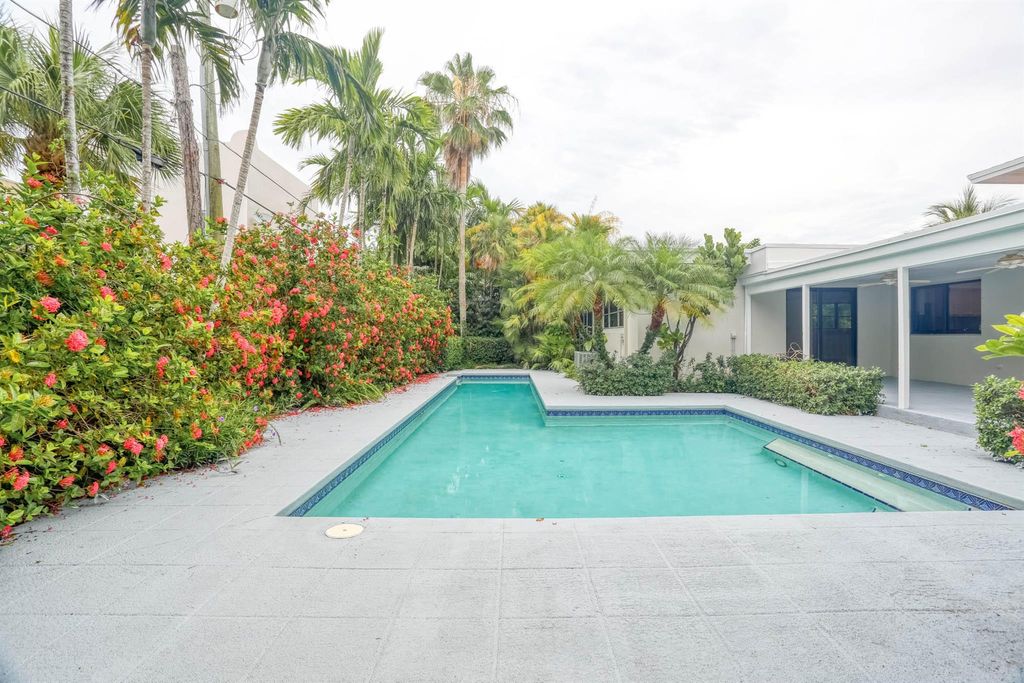 Photo of 121 Costello Road, West Palm Beach, FL 33405 (MLS # R11041728)
